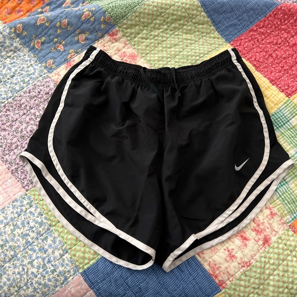 Nike Pants - Nike Ladies large running shorts black/white. No tears or stains, have been worn